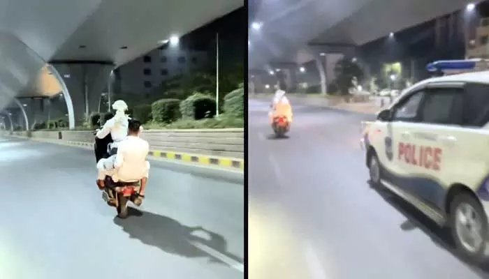 HYD: పోలీసుల ముందే స్టంట్స్ చేసిన పోకిరీలు HYD: పోలీసుల ముందే స్టంట్స్ చేసిన పోకిరీలు