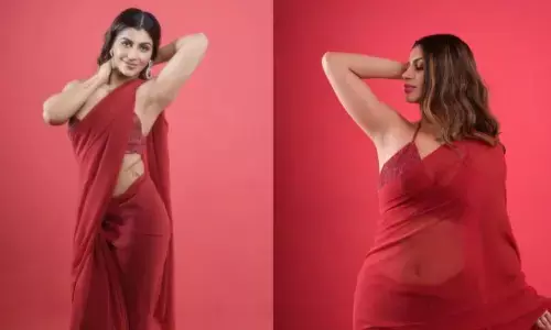 రెడ్ కలర్ శారీలో నడుమందాలతో ఆకట్టుకుంటున్న యషిక ఆనంద్