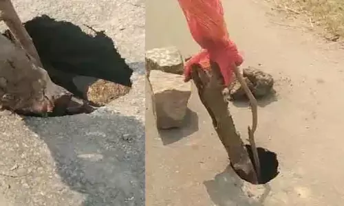 జాతీయ రహదారిపై గుంతలు