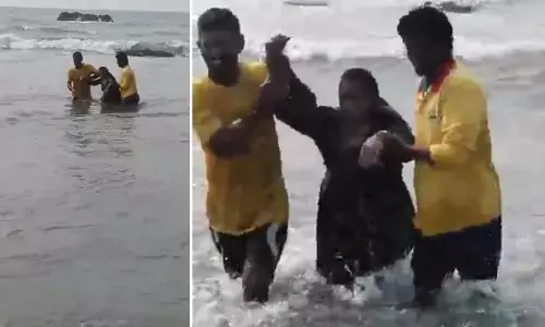 విశాఖ ఆర్కే బీచ్‌లో కలకలం: సముద్రంలో దూకి మహిళ ఆత్మహత్యాయత్నం! కాపాడిన లైఫ్ గార్డ్స్