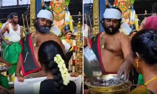 పైసలే ప్రసాదం.. సిగరెట్ కాలుస్తూ ఆశీర్వాదం! వైరల్ అవుతున్న ఓ ఆలయ ఆచారం