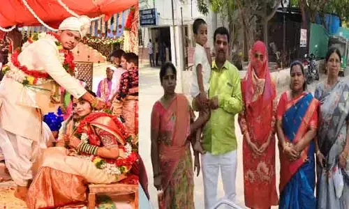 గుట్టు చ‌ప్పుడు కాకుండా రెండో పెళ్లి చేసుకున్న భ‌ర్త ఇంటి ముందు భార్య ఆందోళ‌న