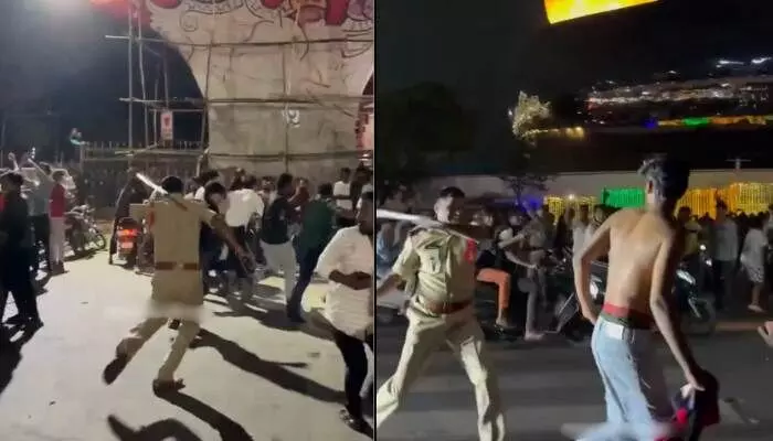 హైదరాబాద్లో హద్దు మీరిన అభిమానం.. పొట్టు పొట్టు కొట్టిన పోలీసులు హైదరాబాద్లో హద్దు మీరిన అభిమానం.. పొట్టు పొట్టు కొట్టిన పోలీసులు