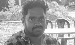 భీమవరంలో తాటిచెట్టు పడి యువకుడు మృతి