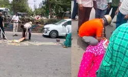 రోడ్డుపై పడ్డ వ్యర్ధాలు... పడిపోయిన ప్రయాణికులు