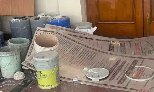 వాడిపడేసిన కలర్ డబ్బాల వద్ద సీఎం శిలాఫలకాలు!