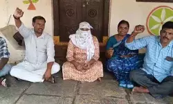 భర్త ఇంటి ముందు భార్య నిరసన...