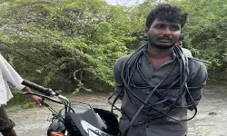 మోటార్ వైర్ల దొంగ పట్టివేత.. స్థానికుల చేతిలో దేహశుద్ధి
