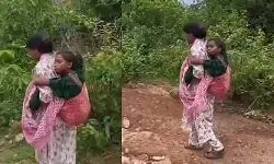 మానవత్వం చాటుకున్న వార్డెన్ హేమ..6 కిలోమీటర్లు విద్యార్థినిని భుజాలపై మోస్తూ