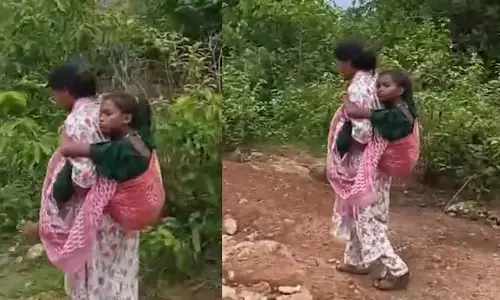 మానవత్వం చాటుకున్న వార్డెన్ హేమ..6 కిలోమీటర్లు విద్యార్థినిని భుజాలపై మోస్తూ