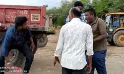 చెరువులో అక్రమ మట్టి తవ్వకాలు.. అడ్డుకున్న అధికారిపై దాడికి యత్నం