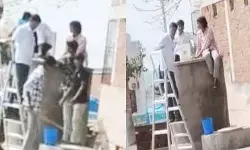 బడి పిల్లలతో ట్యాంకులు కడిగించిన హెడ్మాస్టర్.. ఆగ్రహం వ్యక్తం చేస్తున్న తల్లిదండ్రులు