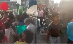 మిల్క్ ట్యాంకర్ బోల్తా.. పాల కోసం ఎగబడ్డ జనం