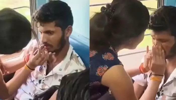 రైలులో ఆకతాయికి వింత శిక్ష.. గాజులు వేసి, లిప్స్టిక్ పూసిన యువతి వైరల్ రైలులో ఆకతాయికి వింత శిక్ష.. గాజులు వేసి, లిప్స్టిక్ పూసిన యువతి వైరల్
