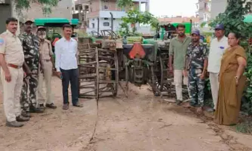 అటవీ భూమిని అక్రమంగా దున్నుతుండగా రెండు ట్రాక్టర్లు సీజ్